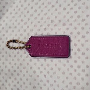 Coach deep plum hang tag charm